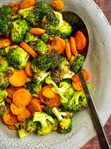 Closeup of air fryer broccoli and carrots.